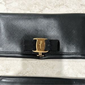 2 Salvatore Ferragamo wallets